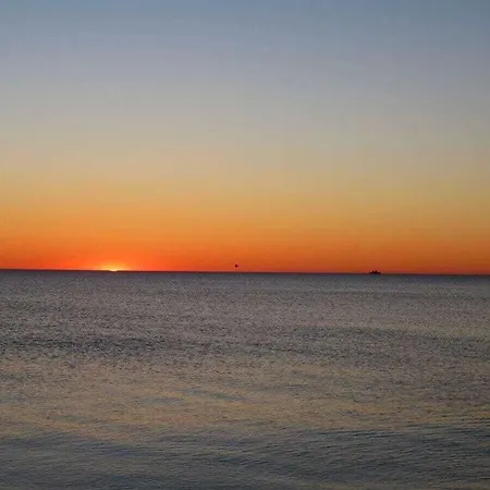 Rhapsody Comfortable Casa de Férias